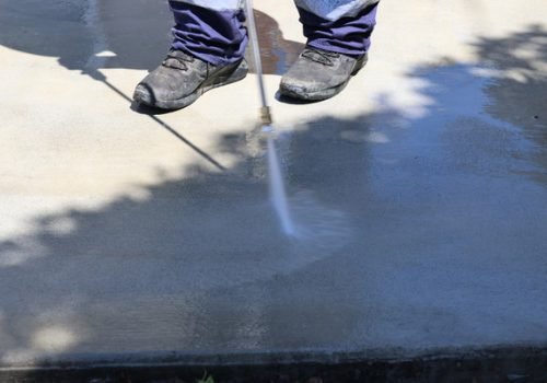 Concrete cleaning in Brisbane with high-pressure washer by Fresh Again expert