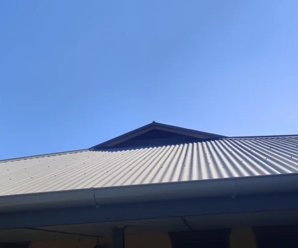 Clean Colorbond metal roof in Brisbane after professional soft washing