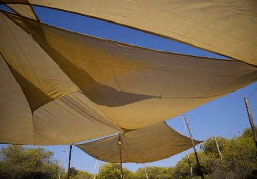 High-quality shade sail installed in a Brisbane outdoor area for sun protection